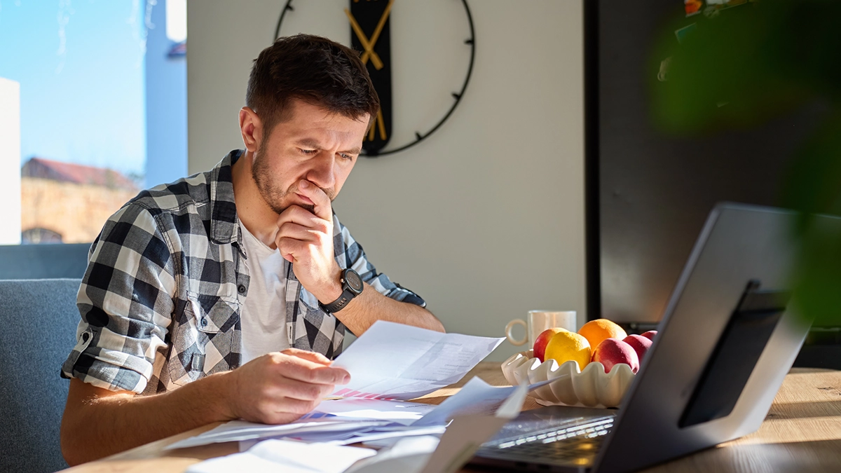 Person reviewing Aetna insurance information while searching for addiction treatment options.